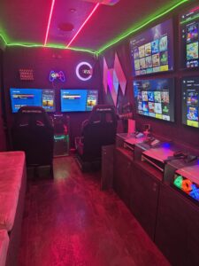 PS5 Pro console setup with LED lighting inside a mobile gaming van in London and Hertfordshire